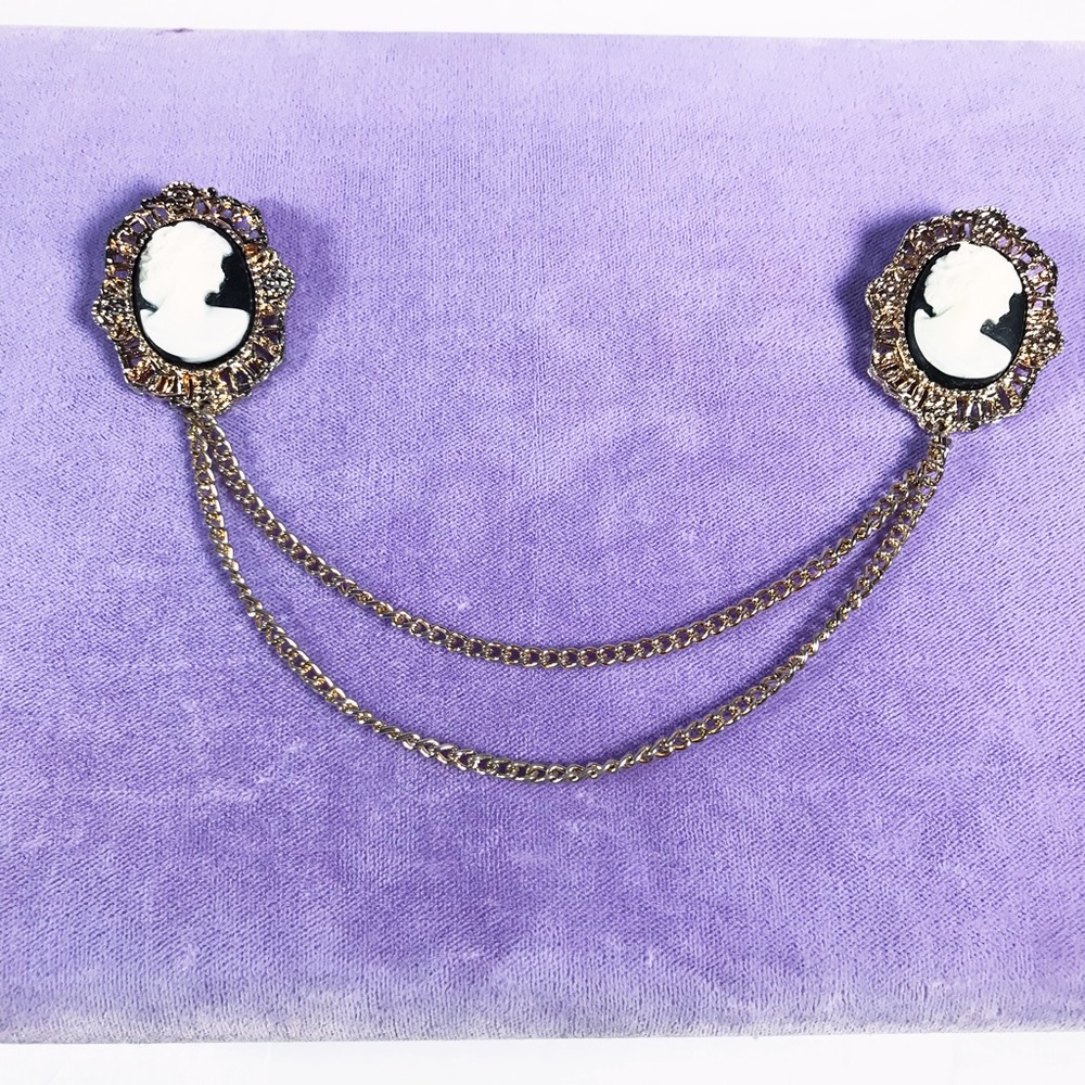 Black cameo victorian sweater clip brooches